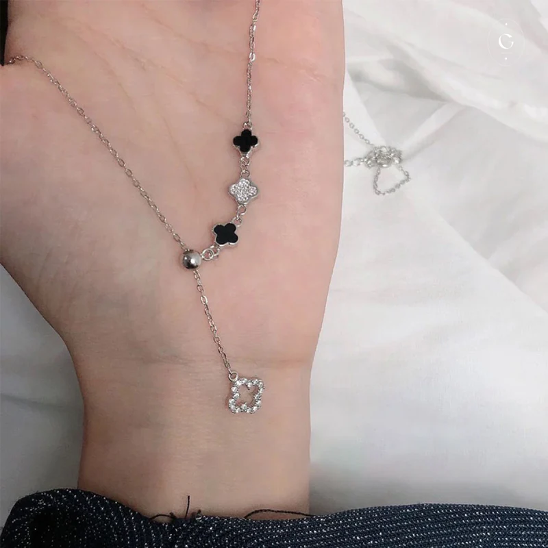 Luxe Silver Four Leaf Clover Necklace: Layer Them for a Unique, Premium Look. - Second Image
